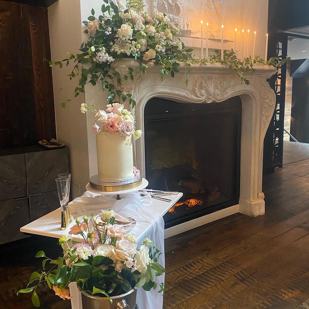 Slope Room Event Flower Arrangement with Fireplace